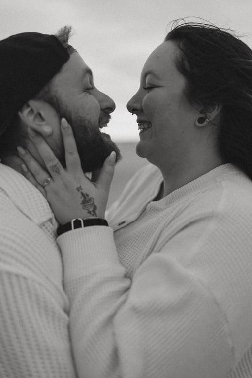 Black and white close-up of laughing couple