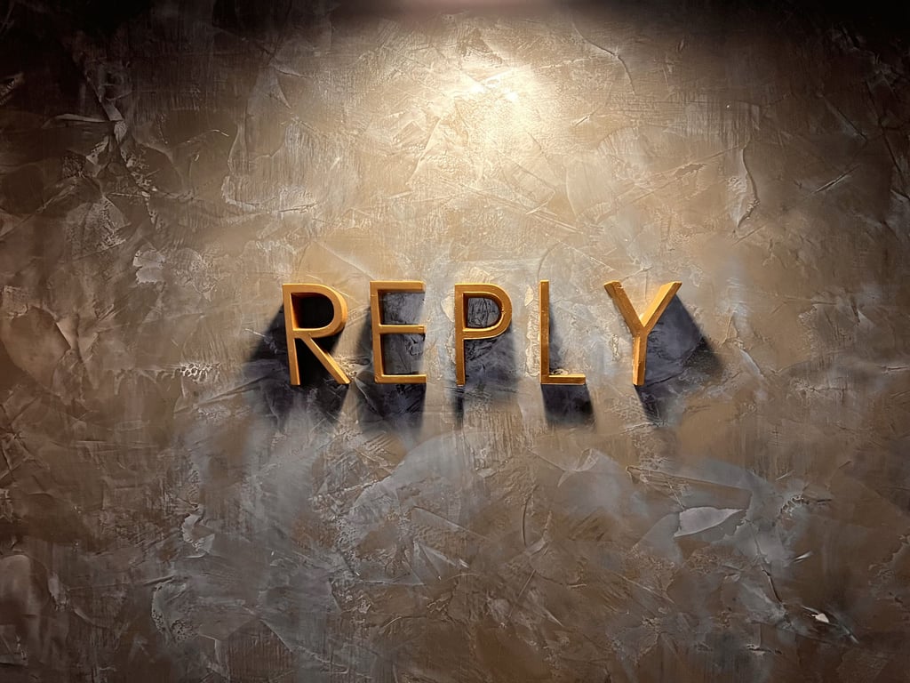 Reply Logo