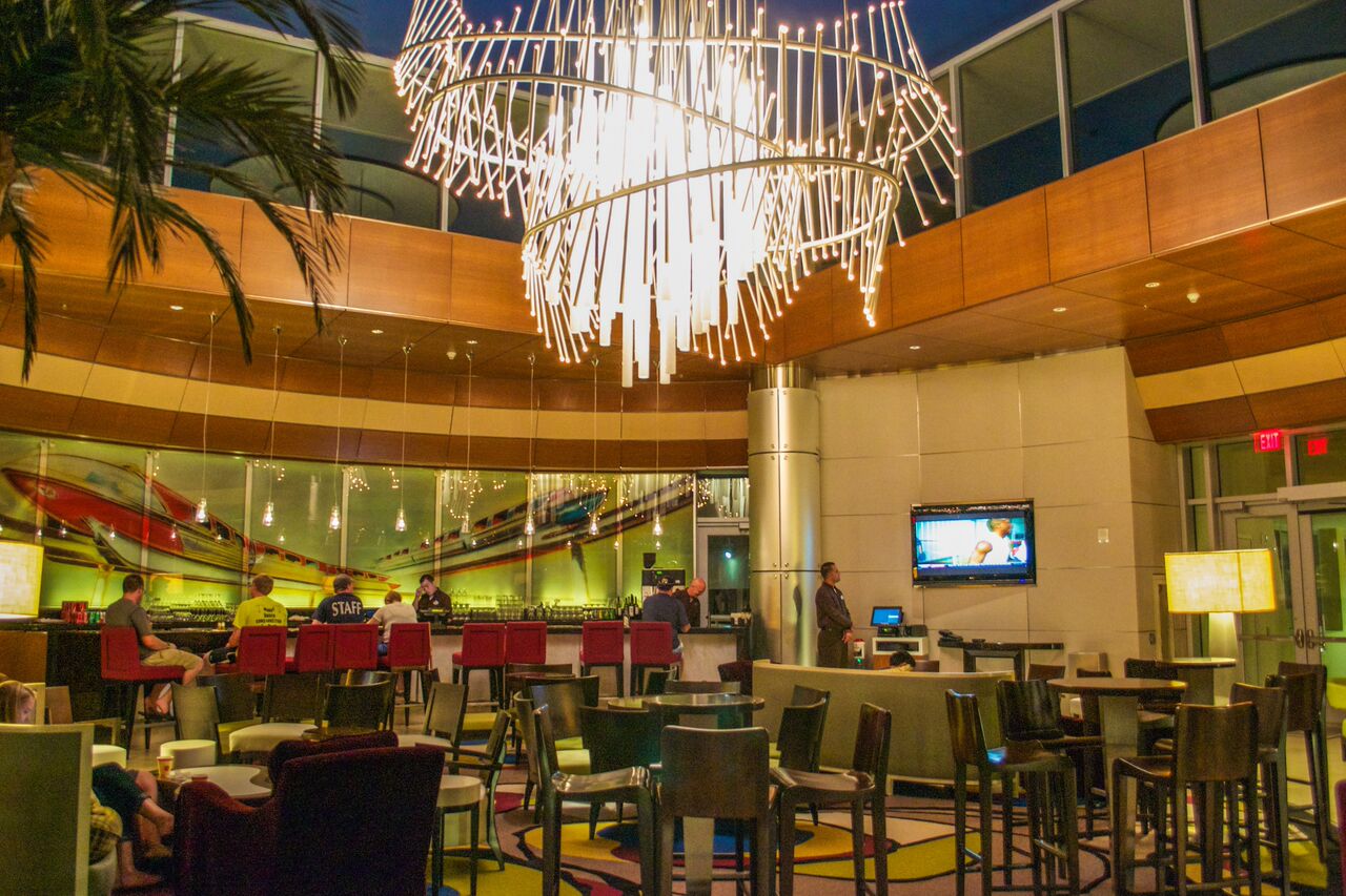 A modern chandelier illuminates the lounge of Bay Lake Tower