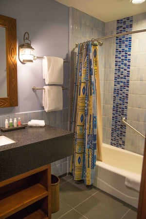 A full guest bathroom in a bungalow at Disney's Polynesian resort