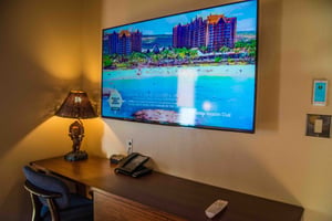 A TV in the master bedroom at a bungalow