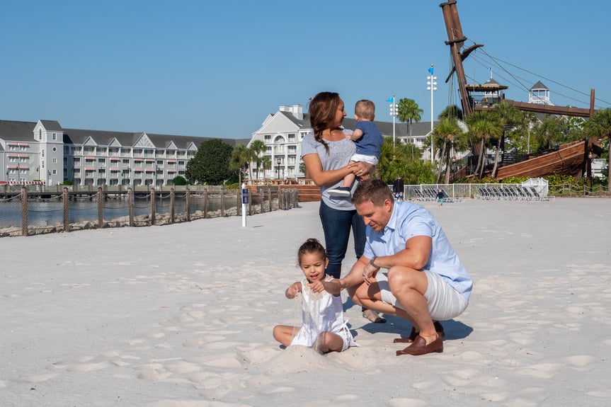 Family pictured at Disney's Beach Club Inn pirate ship