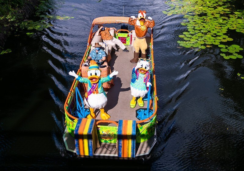 Characters floating down boat at Disney's Animal Kingdom