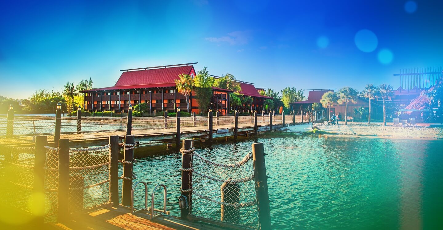 Disney Vacation Club DVC Resort polynesian resort water, beach, and dock.