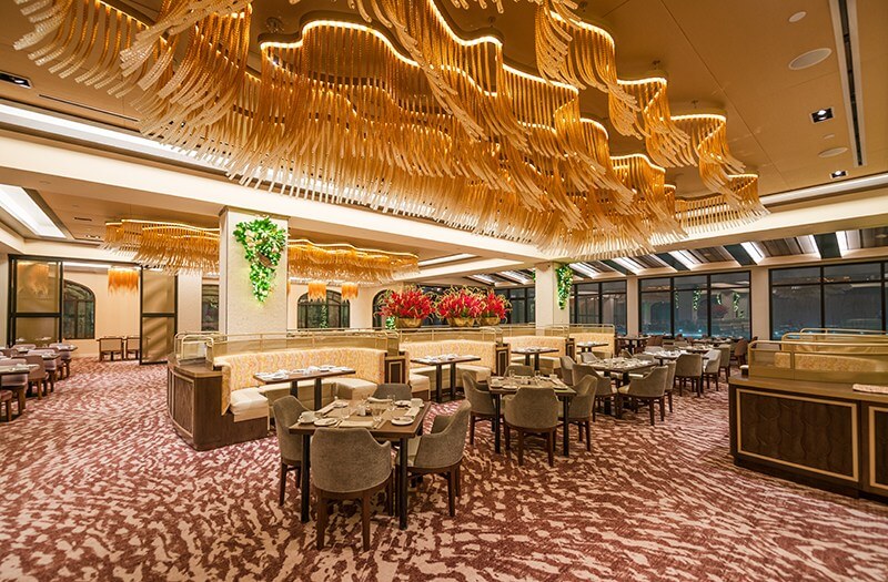 Tables inside Topolino’s Terrace at the Riviera Resort