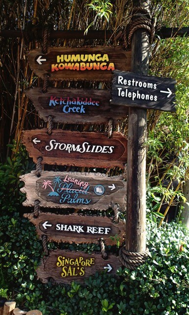 Typhoon Lagoon signs pointing in different directions to the attractions