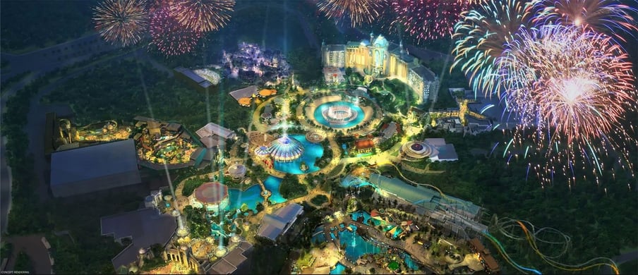 Artists rendering of aerial view of Disney resort with fireworks and lights at night.