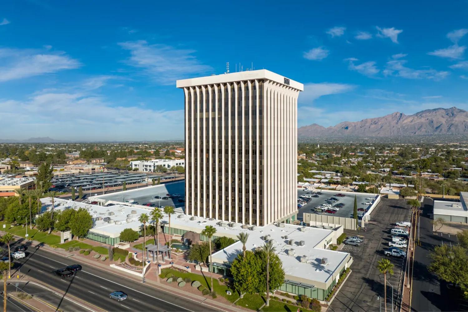 Aerial view of the RJP Tucson office in the 5151 East Broadway tower with the Catalina Mountains in the background