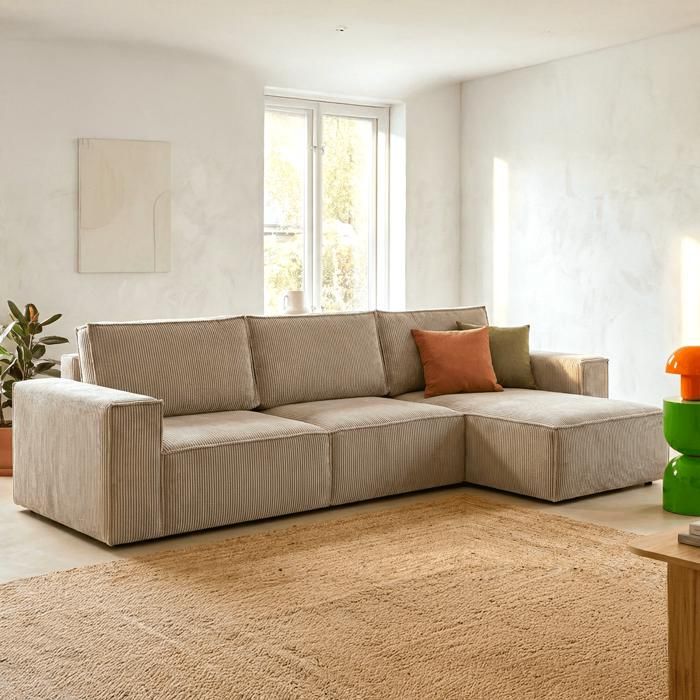 Produit similaire: Canapé d'angle 5 places convertible réversible avec coffre de rangement en velours côtelé taupe - Harper New