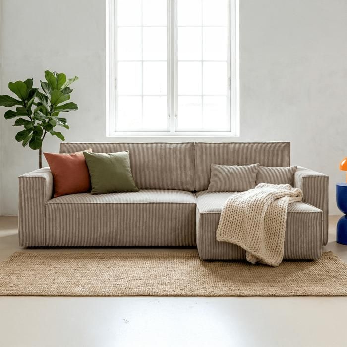 Produit similaire: Canapé d'angle convertible réversible 4 places avec coffre de rangement en velours côtelé taupe - Livia New