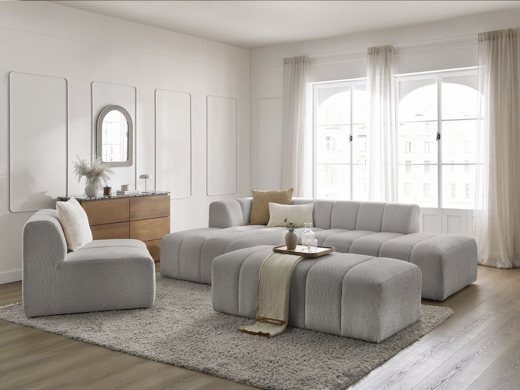Produit similaire: Canapé d'angle fixe modulable ANNECY tissu bouclette avec 1 chauffeuse 1 place et 1 pouf gris clair angle gauche BOBOCHIC 5 places