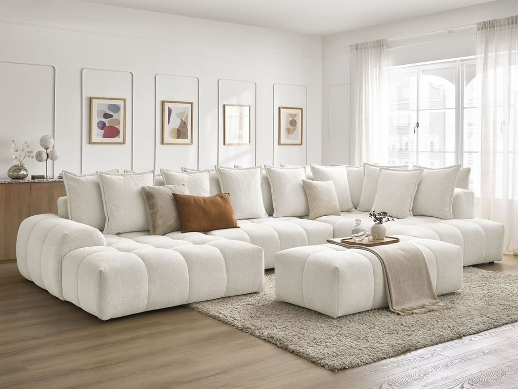 Produit similaire: Canapé panoramique convertible coffre EVEREST tissu chiné avec pouf blanc angle gauche BOBOCHIC 7 places