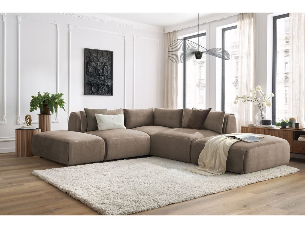 Produit similaire: Canapé d'angle fixe modulable JEANNE tissu velours avec 2 chauffeuses, 1 angle et 2 poufs taupe réversible BOBOCHIC 5 places
