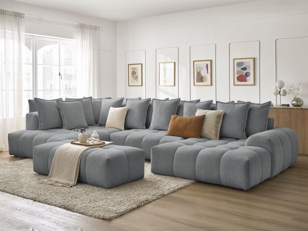 Produit similaire: Canapé panoramique convertible coffre EVEREST tissu chiné avec pouf gris foncé angle droit BOBOCHIC 7 places