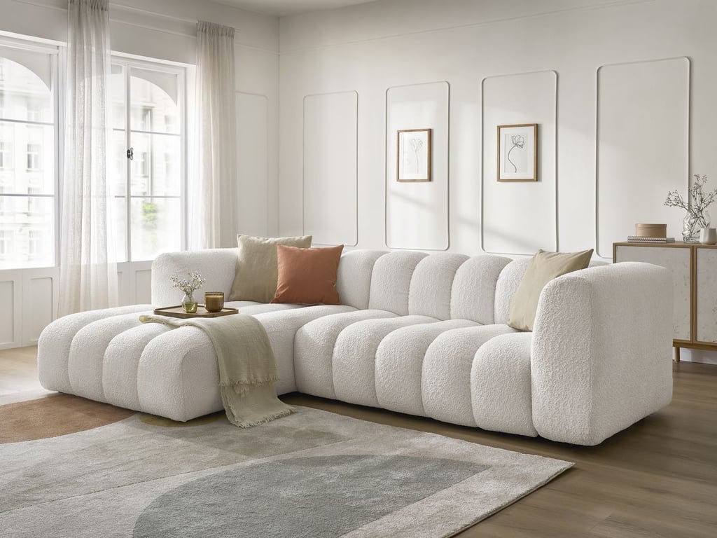 Produit similaire: Canapé d'angle fixe TALIA tissu bouclette blanc angle gauche BOBOCHIC 4 places