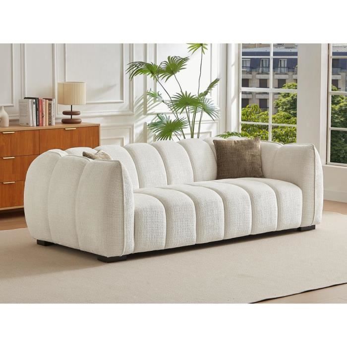 Produit similaire: Canapé 3 places en tissu texturé beige BASDIO