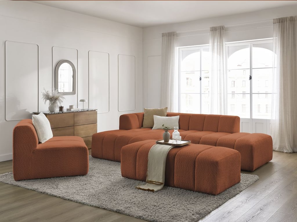 Produit similaire: Canapé d'angle fixe modulable ANNECY tissu bouclette avec 1 chauffeuse 1 place et 1 pouf orange angle gauche BOBOCHIC 5 places