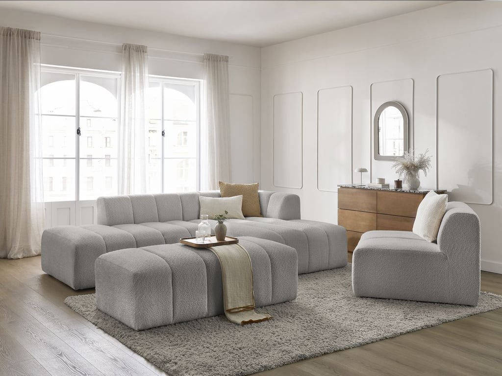 Produit similaire: Canapé d'angle fixe modulable ANNECY tissu bouclette avec 1 chauffeuse 1 place et 1 pouf gris clair angle droit BOBOCHIC 5 places