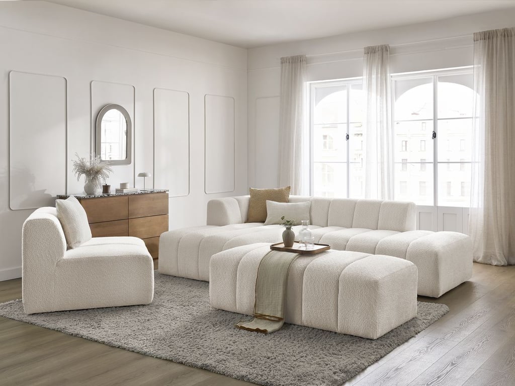 Produit similaire: Canapé d'angle fixe modulable ANNECY tissu bouclette avec 1 chauffeuse 1 place et 1 pouf blanc angle gauche BOBOCHIC 5 places