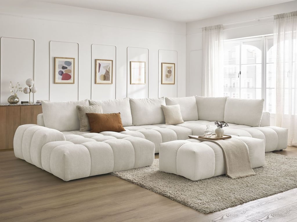 Produit similaire: Canapé panoramique convertible coffre EVEREST tissu texturé avec pouf blanc angle gauche BOBOCHIC 7 places