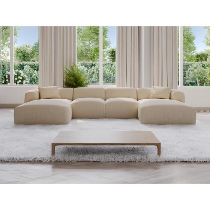 Grand canapé d'angle panoramique en tissu texturé beige POGNI de Maison Céphy