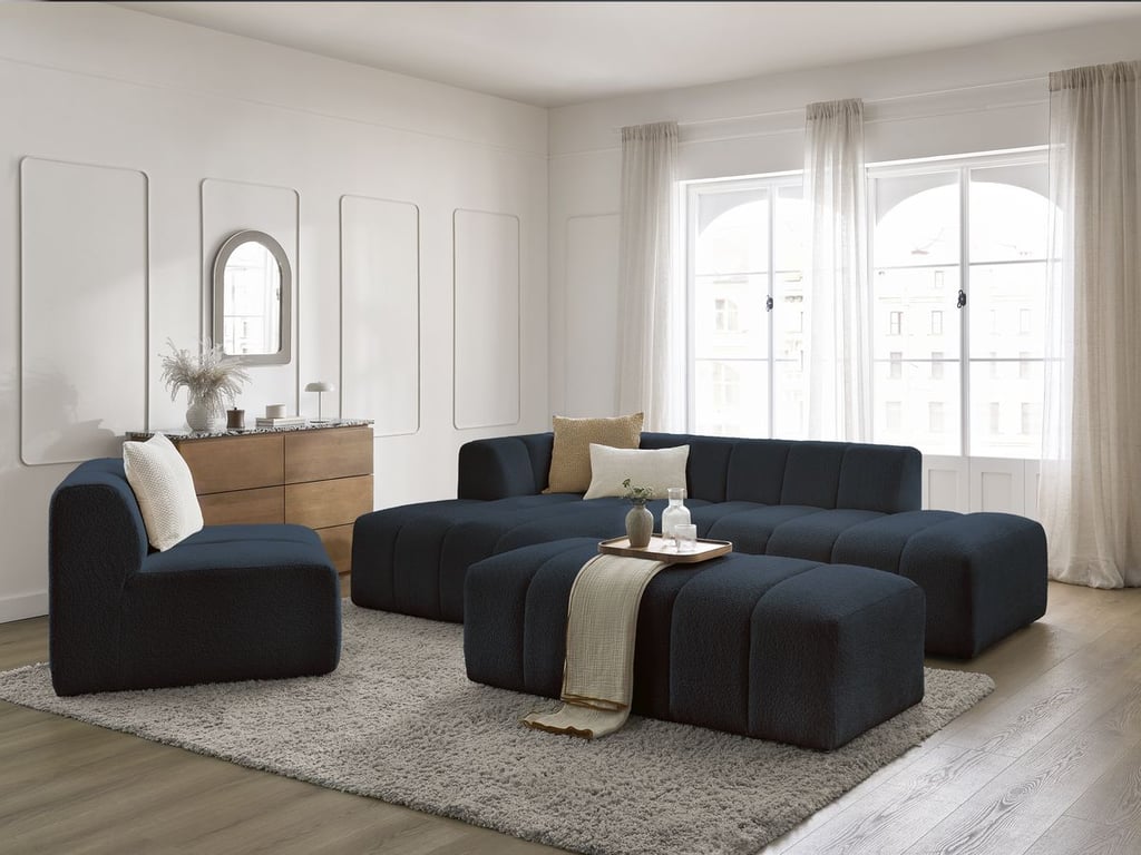 Produit similaire: Canapé d'angle fixe modulable ANNECY tissu bouclette avec 1 chauffeuse 1 place et 1 pouf bleu foncé angle gauche BOBOCHIC 5 places