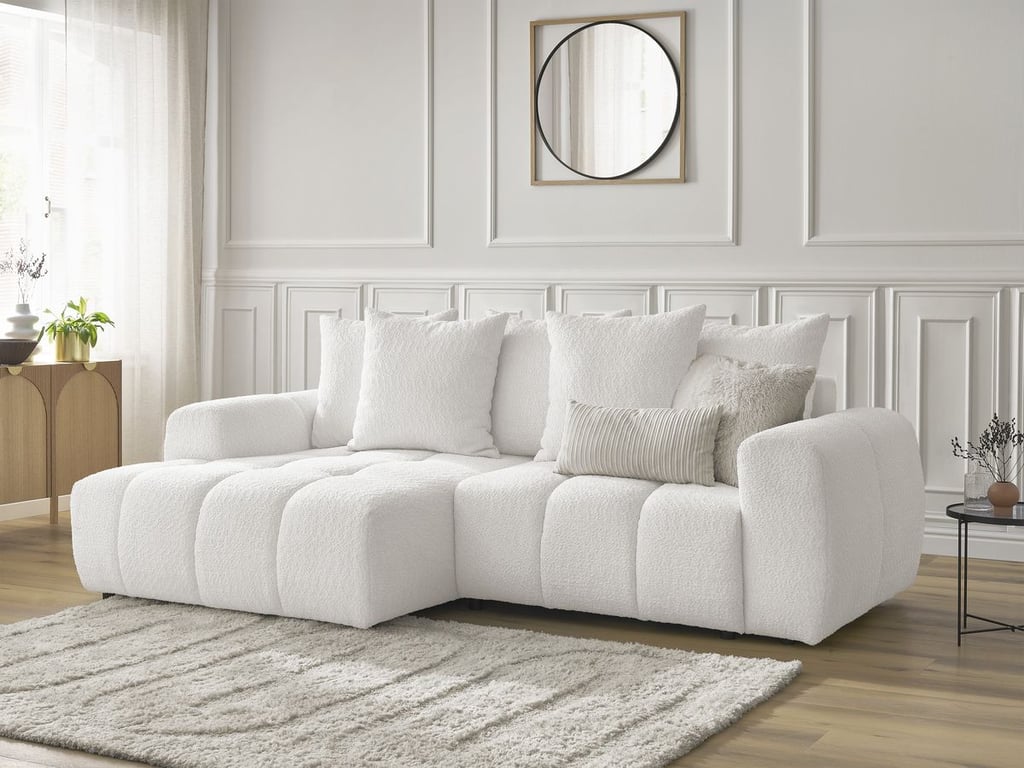 Produit similaire: Canapé d'angle convertible coffre ROXELANE tissu bouclette blanc angle gauche BOBOCHIC 3 places