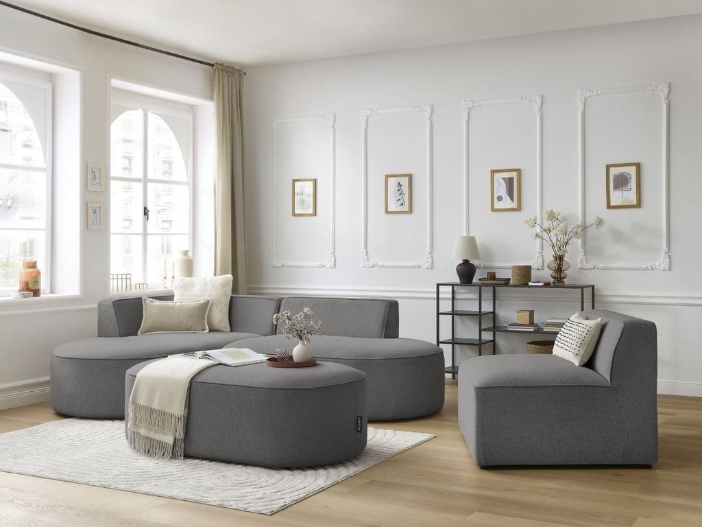 Produit similaire: Canapé d'angle fixe modulable ROUSSEAU tissu chiné avec 1 chauffeuse et 1 pouf gris foncé angle gauche BOBOCHIC 6 places