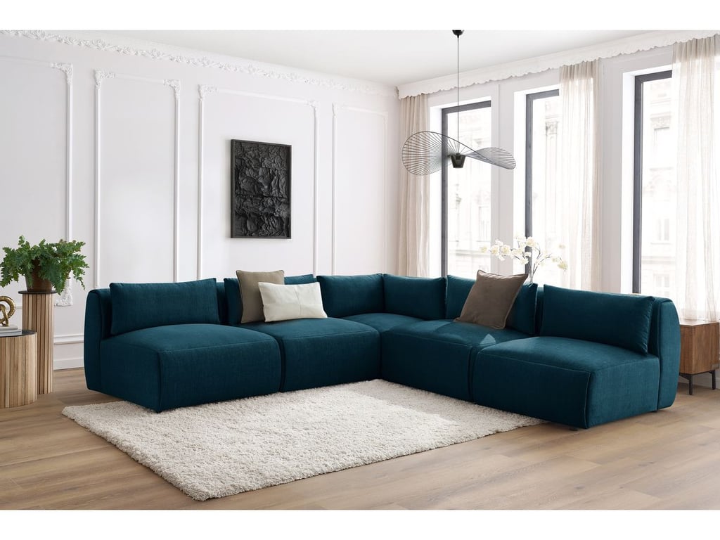 Produit similaire: Canapé d'angle fixe modulable JEANNE tissu velours avec 4 chauffeuses et 1 angle bleu foncé réversible BOBOCHIC 5 places