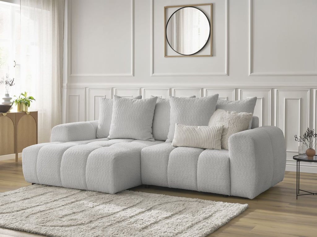 Produit similaire: Canapé d'angle convertible coffre ROXELANE tissu bouclette gris clair angle gauche BOBOCHIC 3 places