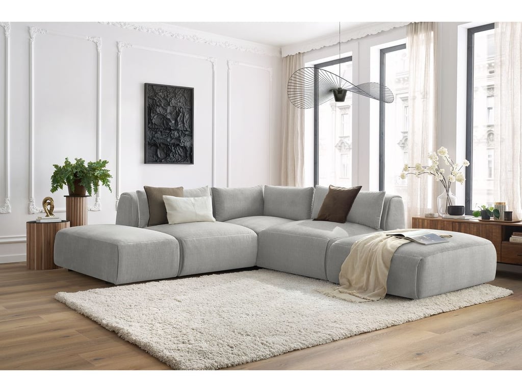 Produit similaire: Canapé d'angle fixe modulable JEANNE tissu velours avec 2 chauffeuses, 1 angle et 2 poufs gris clair réversible BOBOCHIC 5 places