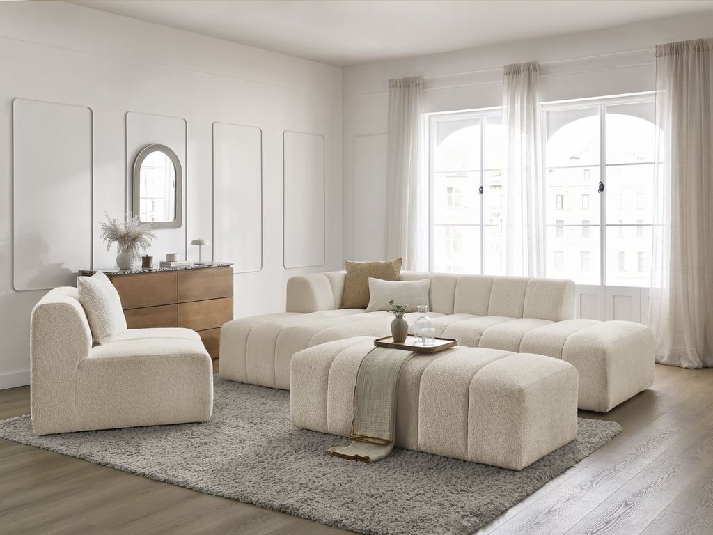 Produit similaire: Canapé d'angle fixe modulable ANNECY tissu bouclette avec 1 chauffeuse 1 place et 1 pouf beige angle gauche BOBOCHIC 5 places