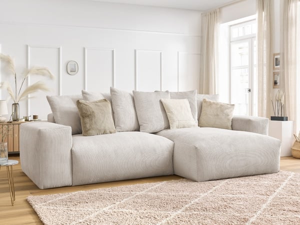 Moelleux canapé d'angle réversible convertible coffre 4 places tissu bouclette voltaire beige