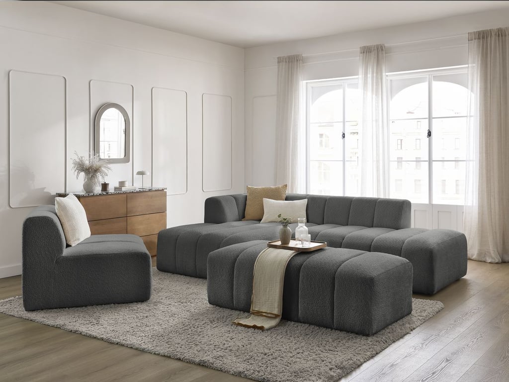 Produit similaire: Canapé d'angle fixe modulable ANNECY tissu bouclette avec 1 chauffeuse 1 place et 1 pouf gris foncé angle gauche BOBOCHIC 5 places