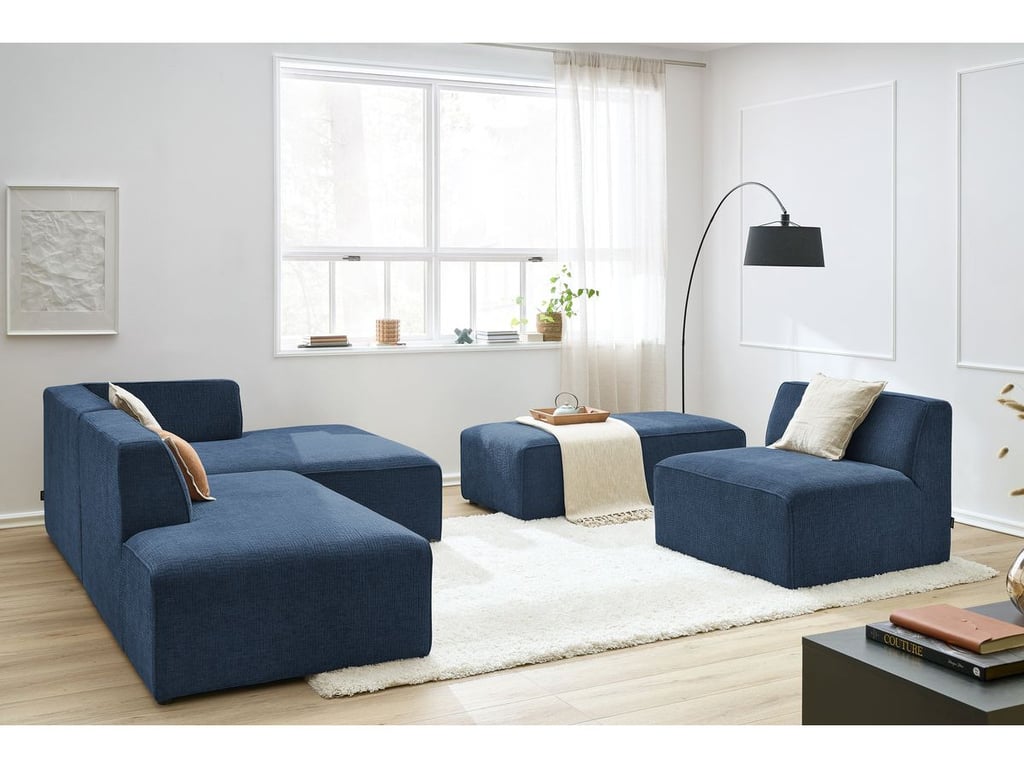 Produit similaire: Canapé d'angle fixe modulable MEGEVE tissu texturé avec 1 chauffeuse et 1 pouf bleu foncé angle droit BOBOCHIC 6 places