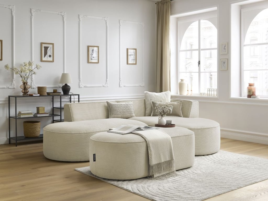 Produit similaire: Canapé d'angle fixe ROUSSEAU velours côtelé avec pouf beige angle droit BOBOCHIC 5 places
