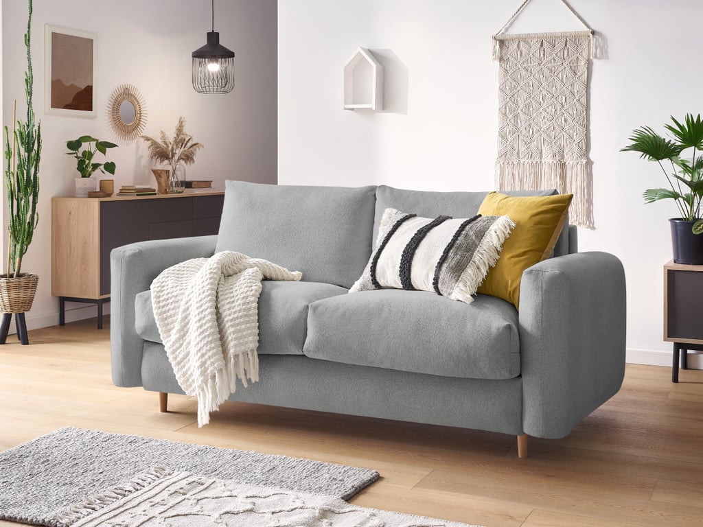 Produit similaire: Cocoone canapé droit convertible 3 places tissu chiné gris clair