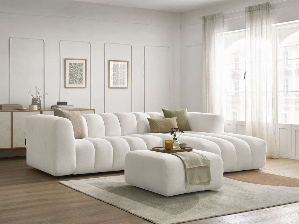 Produit similaire: Canapé d'angle fixe TALIA tissu chiné avec pouf blanc angle droit BOBOCHIC 4 places