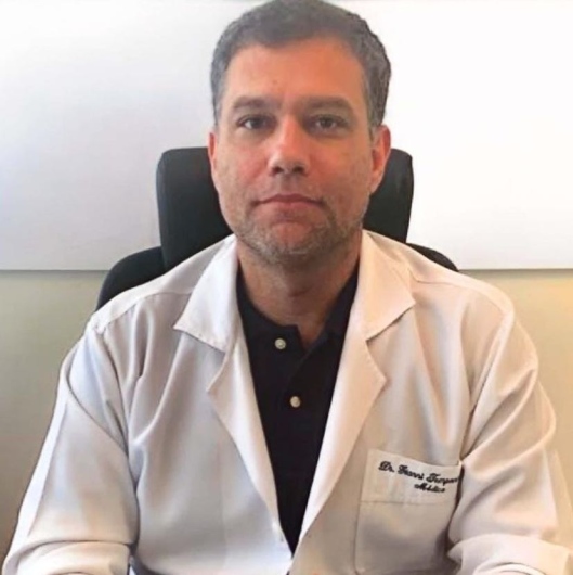 Dr. Gianni Ferraz