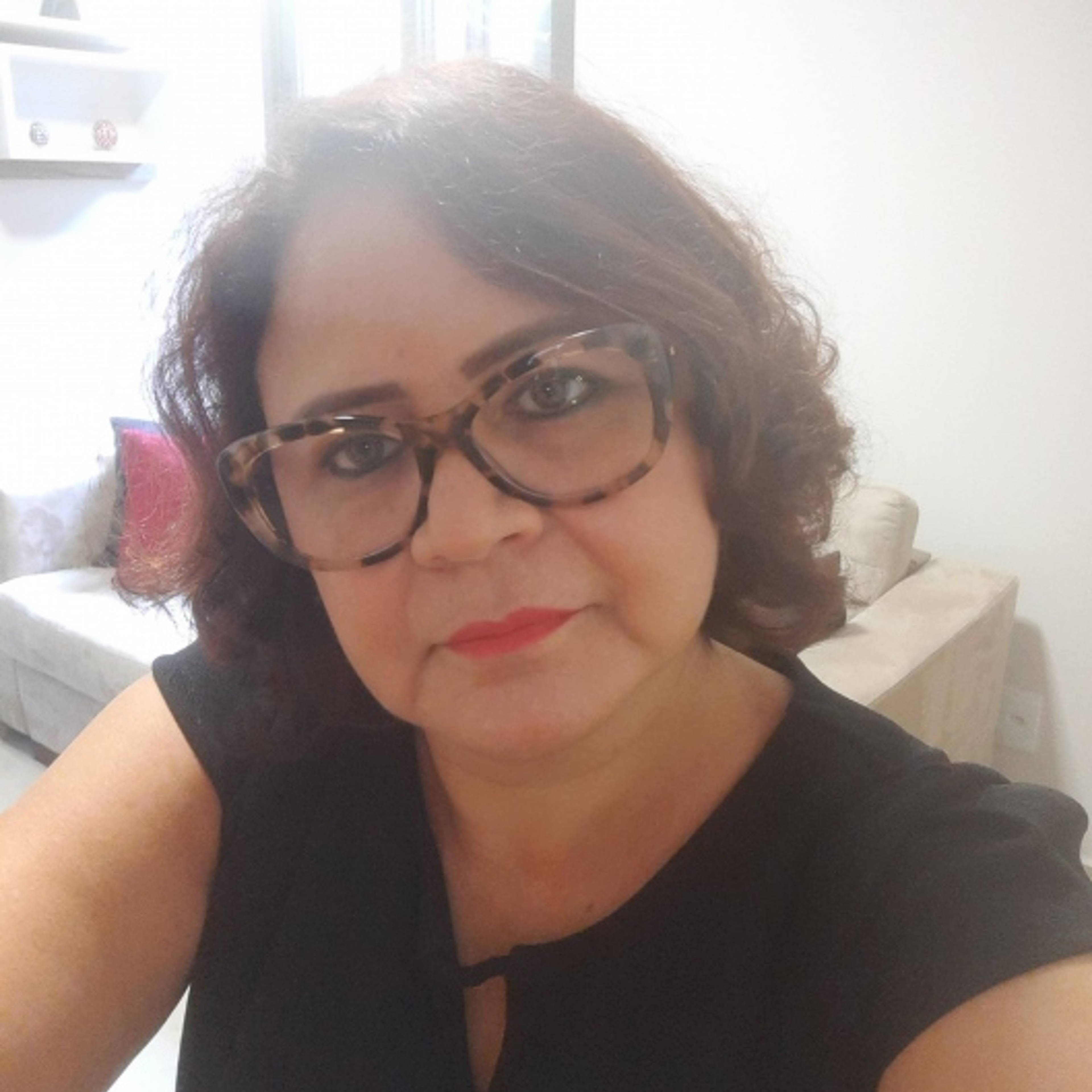 Psi Cláudia Carraro
