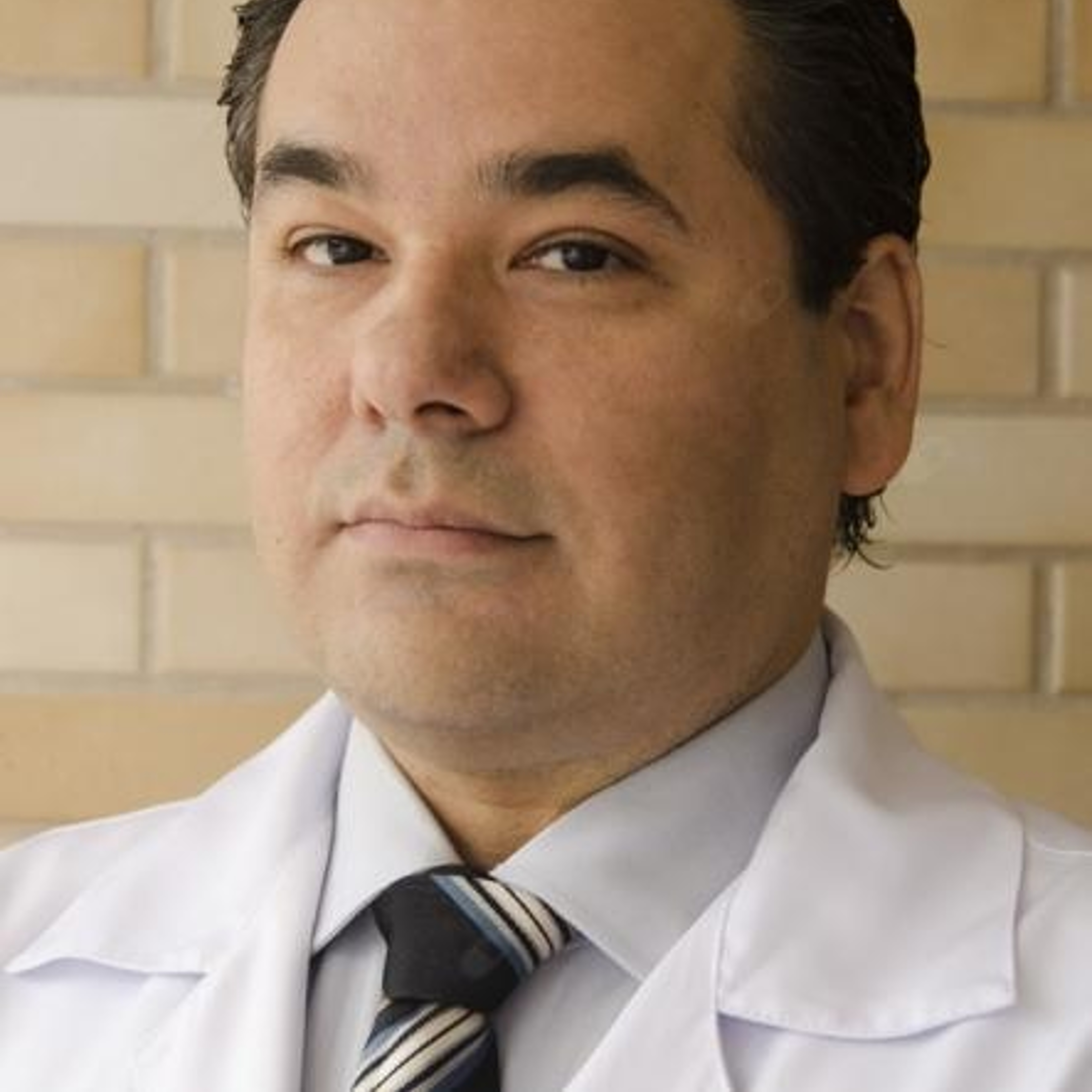 Dr. Winston Martins