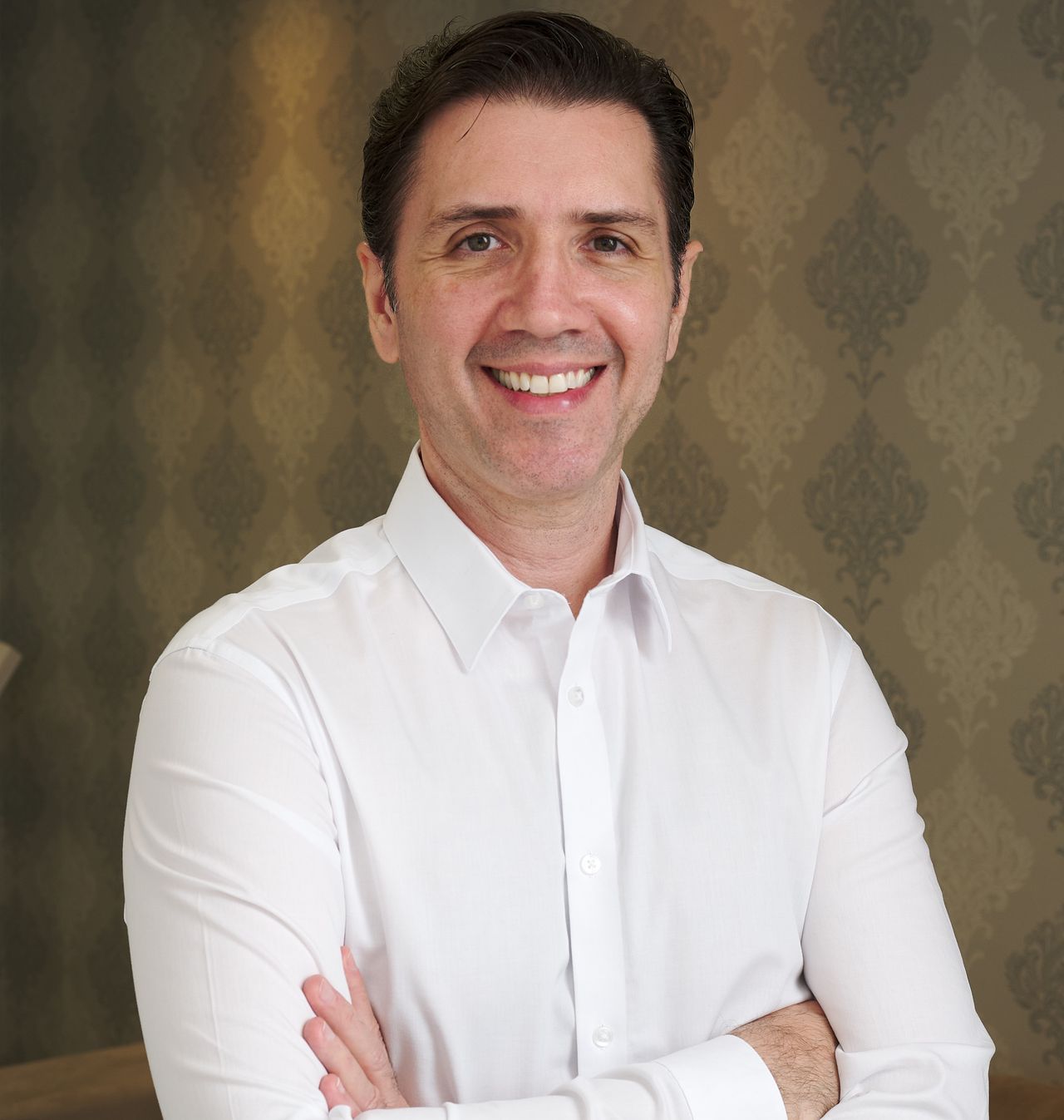 Dr. Denis Milanello