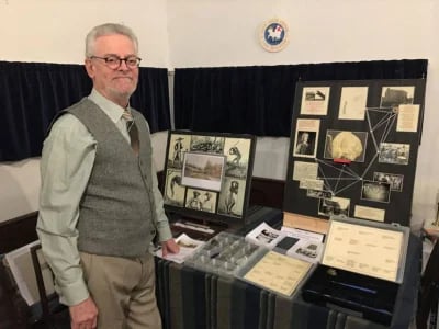 Nigel Pocock with a collection of artefacts.