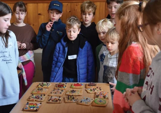 Admiring the finished biscuit tiles
