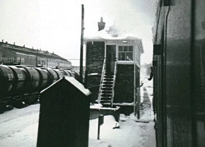 Token exchange at the Chippenham East signal box in the snow