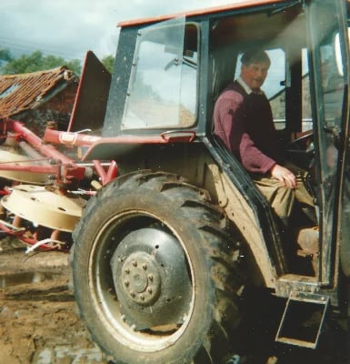 Doug Sawyer on his tractor at Field Farm