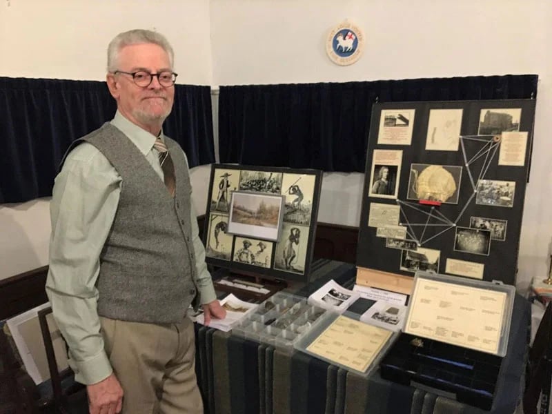 Nigel Pocock with a collection of artefacts.