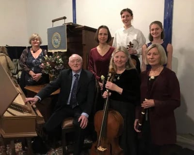 Dr Christopher Kent with his Consort of musicians.
