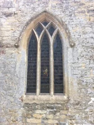 Window on the east side with intersected lacery