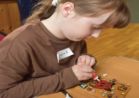 Madeleine, a picture of concentration